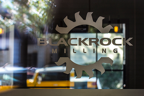 A glass window with our logo